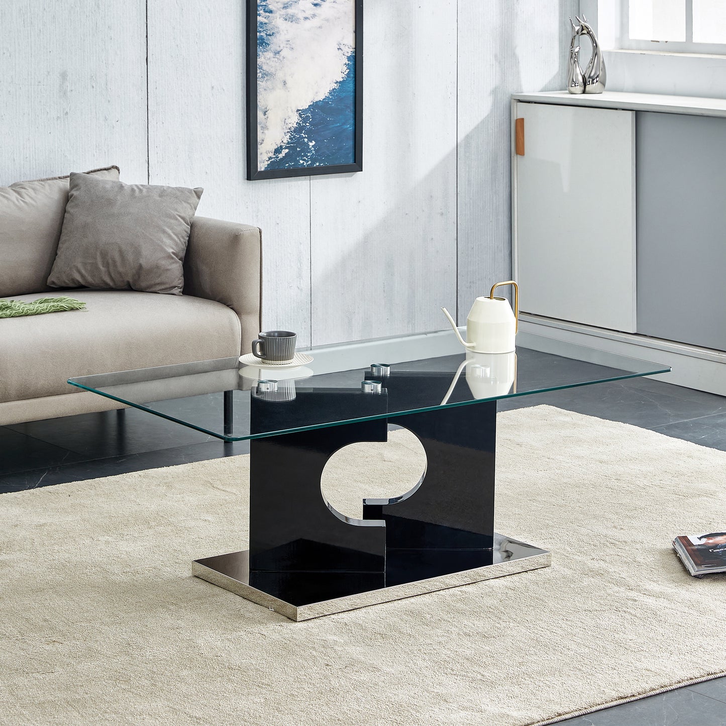 A rectangular modern and fashionable coffee table with tempered glass tabletop and black MDF legs. Suitable for living room.47.2'*25.5'*18'