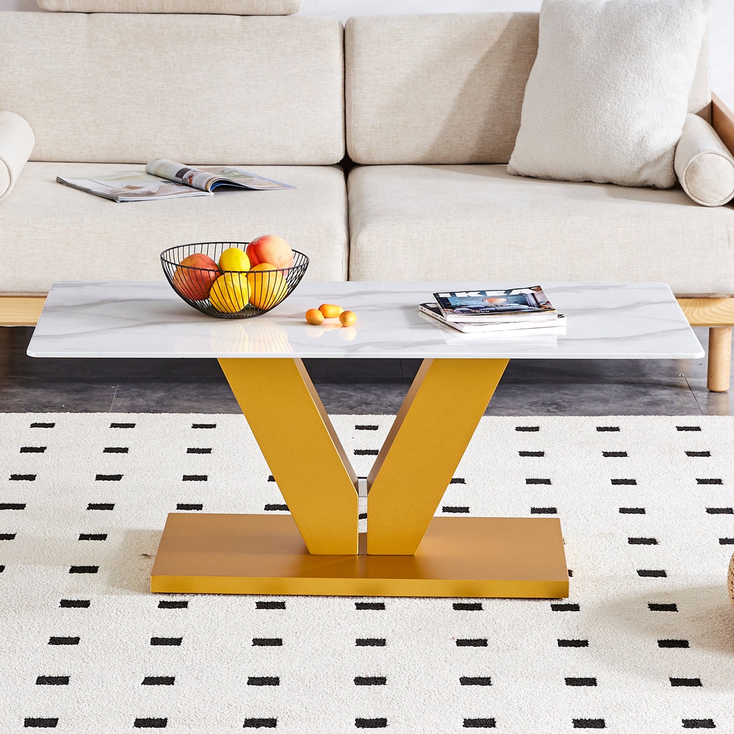 Modern minimalist coffee table. Tempered glass with stickers tabletop,golden MDF pillars. Suitable for living room and dining room